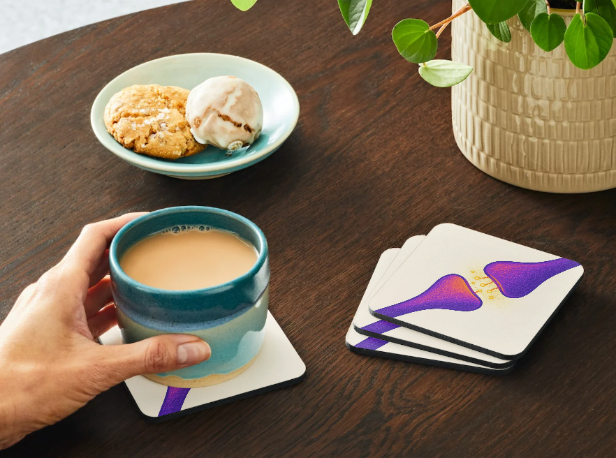 Neurotransmitter Purple Synapse Cork Coaster (4-Pack) _ Home Decor _ BioBrainBuddies _ biology gifts, brain art, brain coasters, geek gift, lab decor, nerdy home decor, neuron art gift, neuroscience decor, psychology student gift, purple aesthetic decor, science coasters, science teacher gift, scientist mug coaster, synapse coaster